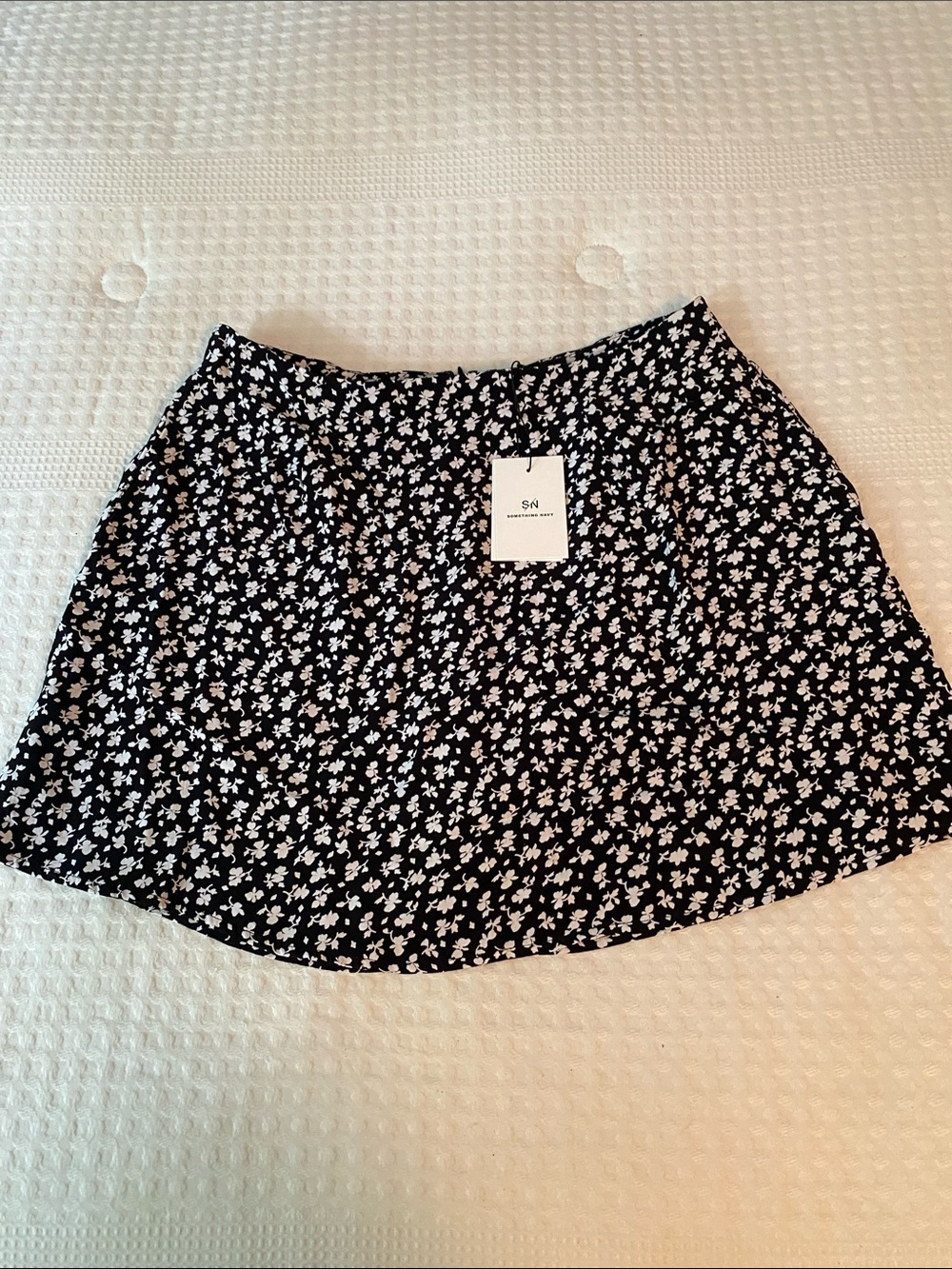 Something Navy Black Mini Skirt with White Floral Print